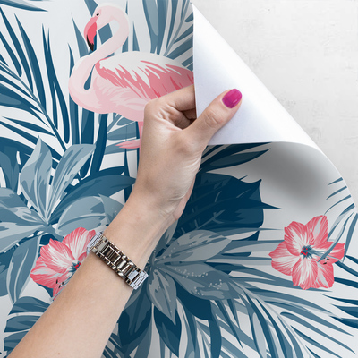 Tapisserie murale Flamants roses dans des feuilles tropicales