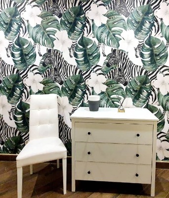 Tapisserie murale Zèbres parmi les plantes paradisiaques