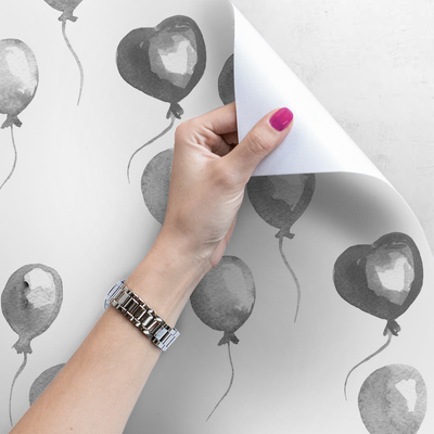 Papier peint Des ballons flottant dans les airs