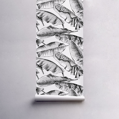 Papier peint Feuilles noires dans le vent