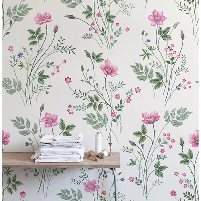 Papier peint Le printemps dans la prairie fleurie