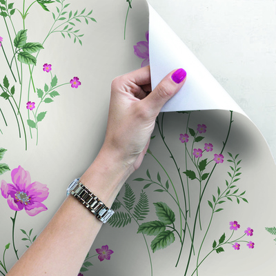 Papier peint Le printemps dans la prairie fleurie