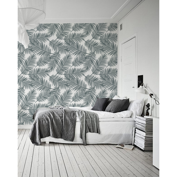 Papier peint Un souffle de vent dans les feuilles de palmier