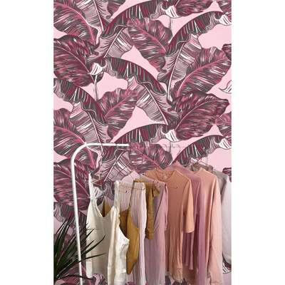 Tapisserie panoramique Fabuleuses feuilles de palmier roses