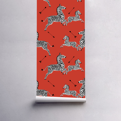 Papier peint Zèbres sur fond rouge