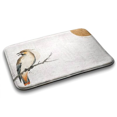 Tapis de bain Un oiseau sur une branche