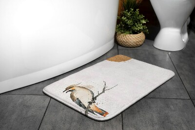 Tapis de bain Un oiseau sur une branche