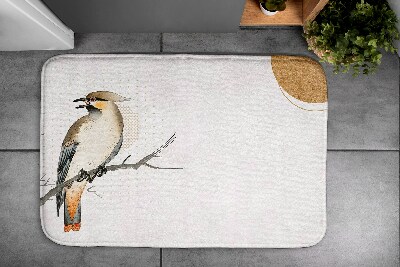 Tapis de bain Un oiseau sur une branche