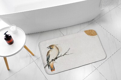 Tapis de bain Un oiseau sur une branche