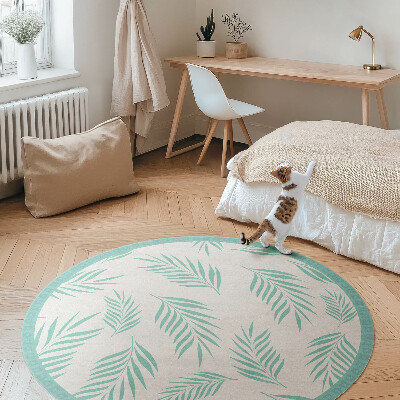 Tapis rond en vinyle Branches de palmier et feuilles tropicales