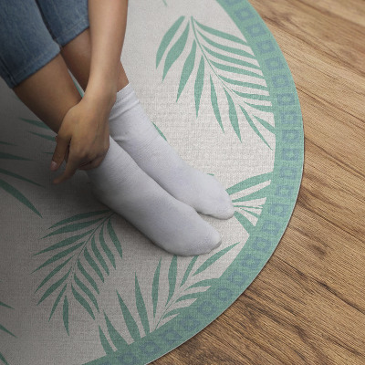 Tapis rond en vinyle Branches de palmier et feuilles tropicales