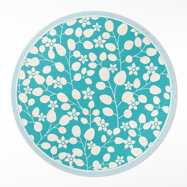 Tapis rond en vinyle Une composition de fleurs et de feuilles sauvages