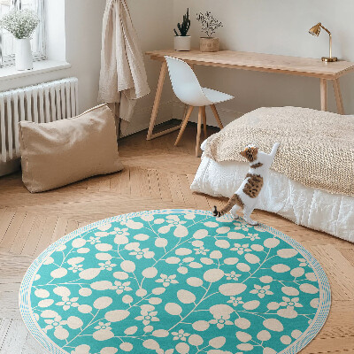 Tapis rond en vinyle Une composition de fleurs et de feuilles sauvages