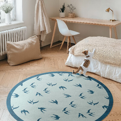 Tapis rond en vinyle Petites feuilles sur fond bleu