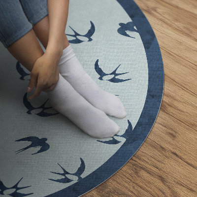 Tapis rond en vinyle Petites feuilles sur fond bleu