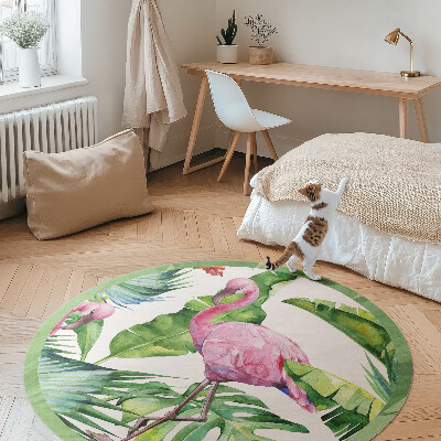 Tapis rond en vinyle Flamant rose dans des feuilles de bananier