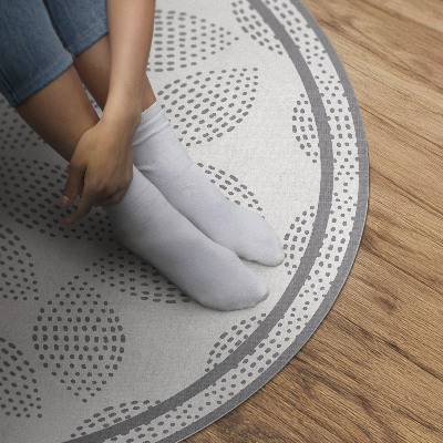 Tapis vinyle Une composition de feuilles sombres avec des points