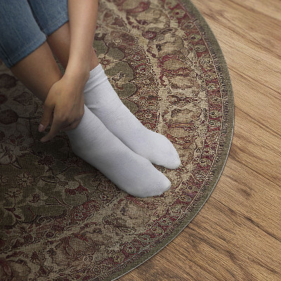 Tapis rond en vinyle Symétrie terrestre dans les motifs persans