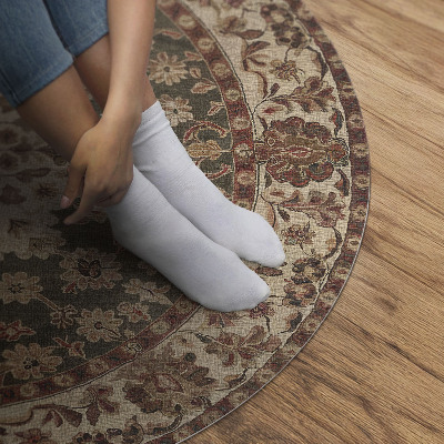 Tapis rond en vinyle Motifs persans subtils dans des tons sable