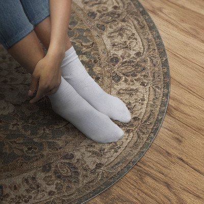 Tapis rond en vinyle Ornements persans aux couleurs subtiles