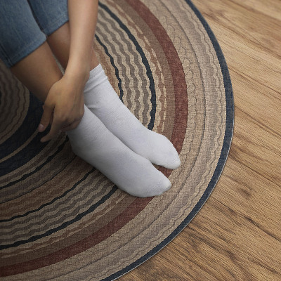 Tapis rond en vinyle Tresse aux tons chauds