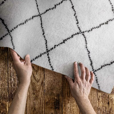 Tapis vinyle Peluche imitation motif lignes noires