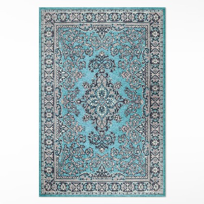 Tapis vinyle rectangulaire Motif décoratif bleu avec un motif végétal
