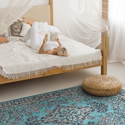 Tapis vinyle rectangulaire Motif décoratif bleu avec un motif végétal