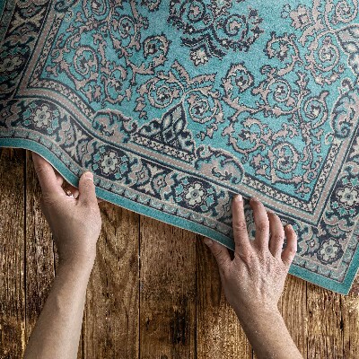 Tapis vinyle rectangulaire Motif décoratif bleu avec un motif végétal