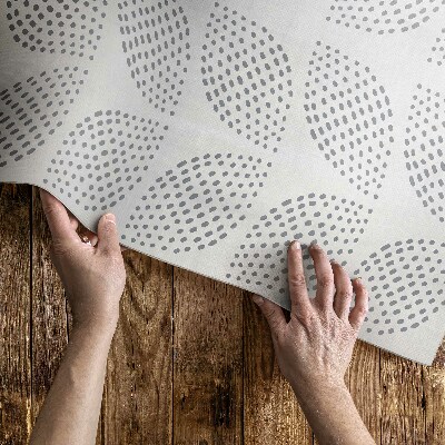 Tapis vinyle Une composition de feuilles sombres avec des points