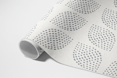 Tapis vinyle Une composition de feuilles sombres avec des points