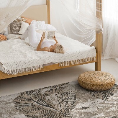 Tapis vinyle Feuilles de plantes et texture de béton brut