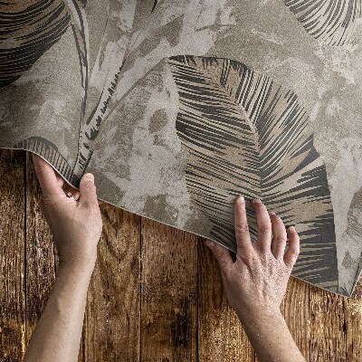 Tapis vinyle Feuilles de plantes et texture de béton brut