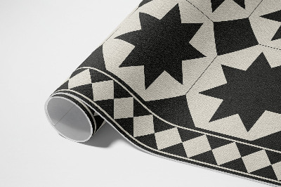 Tapis vinyle d’extérieur Mosaïque élégante d'étoiles noires et blanches