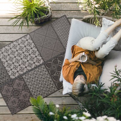 Tapis vinyle d’extérieur Une combinaison de différents motifs, tissu imitation