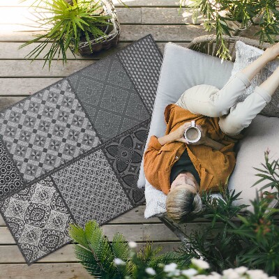 Tapis vinyle d’extérieur Un mélange de motifs, imitation tissu