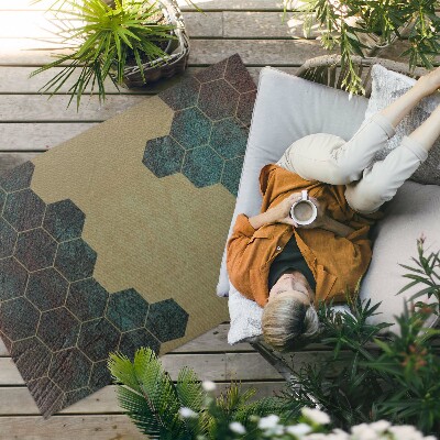 Tapis vinyle d’extérieur Hexagones en béton au design moderne