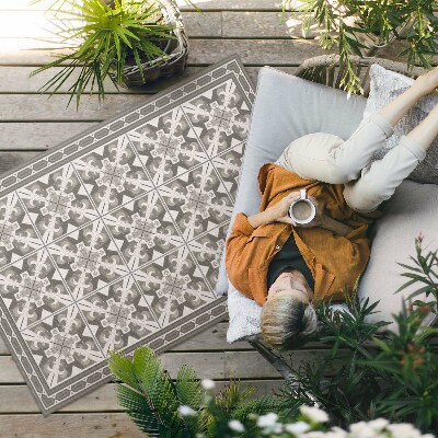 Tapis vinyle d’extérieur Carreaux décorés de losanges géométriques