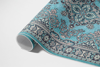 Tapis vinyle d’extérieur Motif décoratif bleu avec un motif végétal