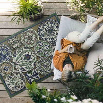Tapis vinyle d’extérieur Les roues à motifs d'Albert Racinet