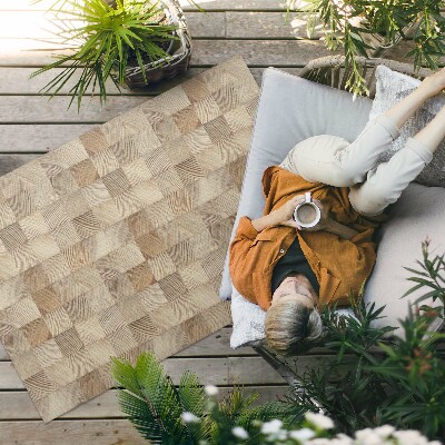 Tapis vinyle d’extérieur Mosaïque de cernes d'arbres en carrés de bois