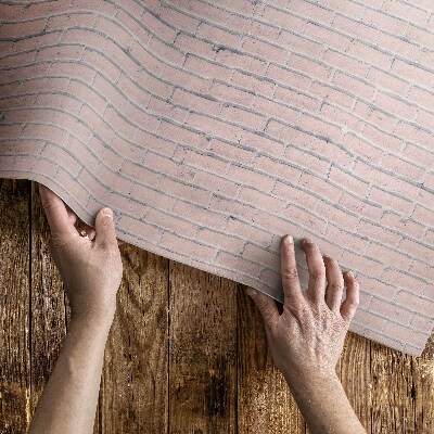 Tapis vinyle d’extérieur Petit mur de briques pastel