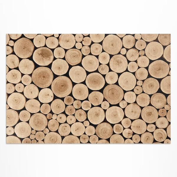 Tapis vinyle d’extérieur Troncs d'arbres piquets en bois
