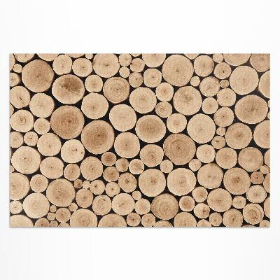 Tapis vinyle d’extérieur Troncs d'arbres piquets en bois