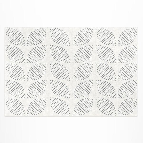 Tapis vinyle d’extérieur Une composition de feuilles sombres avec des points