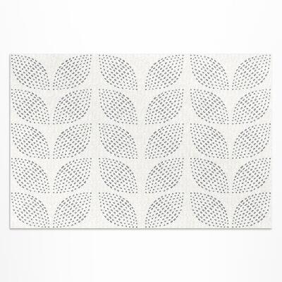 Tapis vinyle d’extérieur Une composition de feuilles sombres avec des points