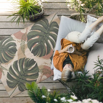 Tapis vinyle d’extérieur Une composition de feuilles de monstera et de fougères vintage