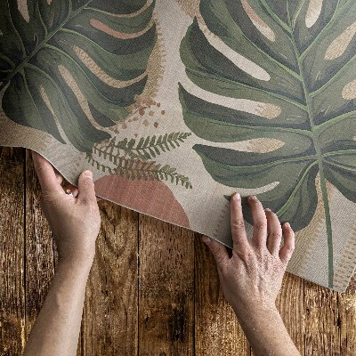 Tapis vinyle d’extérieur Une composition de feuilles de monstera et de fougères vintage