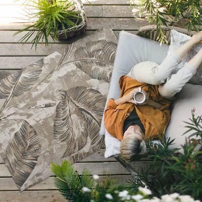 Tapis vinyle d’extérieur Feuilles de plantes et texture de béton brut