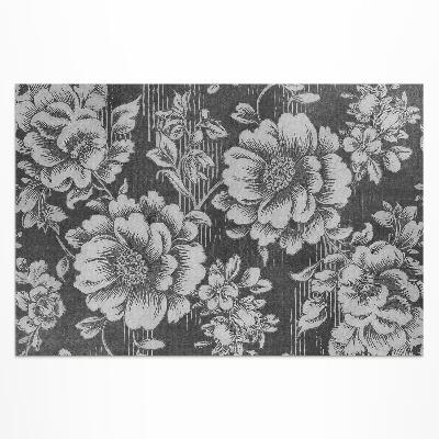 Tapis vinyle d’extérieur Des accents floraux subtils